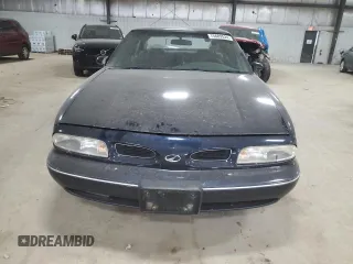 1998 Oldsmobile 88 LS z VIN 1G3HN52K5W4867072, wystawiony jako Copart lot #75689524 z przebiegiem 192 507 mil mil oraz Szkoda całkowita • Salvage title. Historia ofert i sprzedaży dostępna na DreamBid. Obrazek 5.