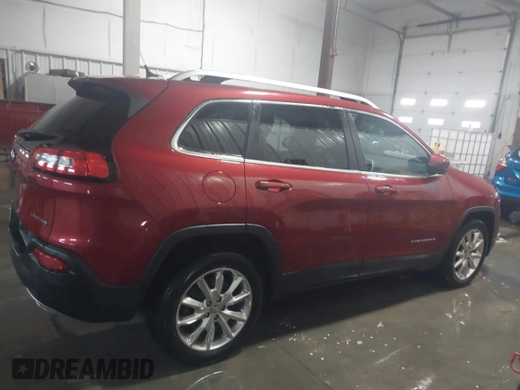 2015 Jeep Cherokee Limited with VIN 1C4PJLDS0FW585595, listed as a IAAI auction lot 41371621 with 102,108 mi miles and . Bid and sale history available at DreamBid. Image 13.