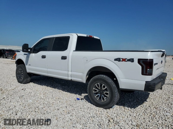 2015 Ford F-150 XLT w/HD Payload Pkg with VIN 1FTFW1EG6FFA02457, listed as a Copart auction lot 52121515 with 242,747 mi miles and Salvage Title. Bid and sale history available at carsss.com. Image 2.