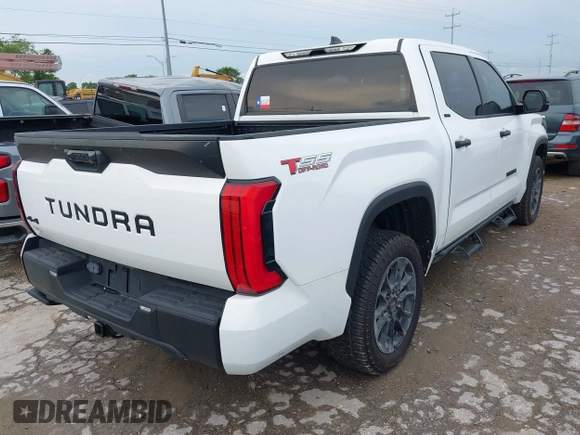2023 Toyota Tundra SR5 with VIN 5TFLA5DB0PX077679, listed as a IAAI auction lot 42354545 with 31,838 mi miles and . Bid and sale history available at DreamBid. Image 4.
