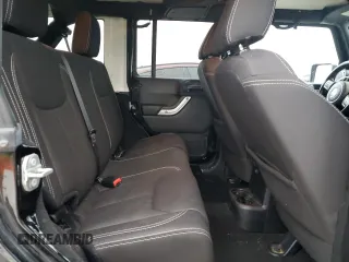 2015 Jeep Wrangler Unlimited Sahara with VIN 1C4BJWEGXFL606573, listed as a Copart auction lot 83983894 with 103,314 mi miles and Clean title. Bid and sale history available at DreamBid. Image 11.