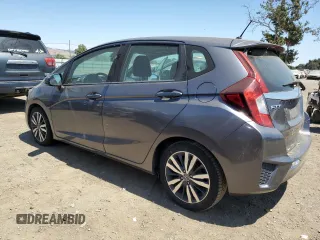2015 Honda Fit EX-L with VIN 3HGGK5H83FM752900, listed as a Copart auction lot 62560045 with 217,574 mi miles and Clean title. Bid and sale history available at DreamBid. Image 2.