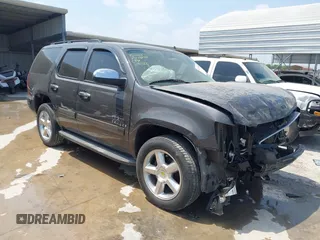 2010 Chevrolet Tahoe LS z VIN 1GNUCAE02AR290222, wystawiony jako IAAI lot #42321824 z przebiegiem 188 926 mil mil oraz . Historia ofert i sprzedaży dostępna na DreamBid. Obrazek 1.