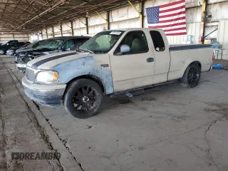 1999 Ford F-150 with VIN 1FTZX172XXKA26359, listed as a Copart auction lot 52215805 with 268,403 mi miles and Salvage title. Bid and sale history available at DreamBid. Image 1.