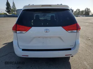 2013 Toyota Sienna XLE AAS with VIN 5TDYK3DC5DS322039, listed as a Copart auction lot 61657715 with 185,269 mi miles and Salvage title. Bid and sale history available at DreamBid. Image 6.