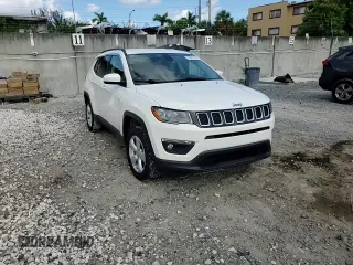 2019 Jeep Compass Latitude z VIN 3C4NJDBB8KT735291, wystawiony jako Copart lot #61901165 z przebiegiem 94 870 mil mil oraz Szkoda całkowita • Salvage title. Historia ofert i sprzedaży dostępna na DreamBid. Obrazek 13.
