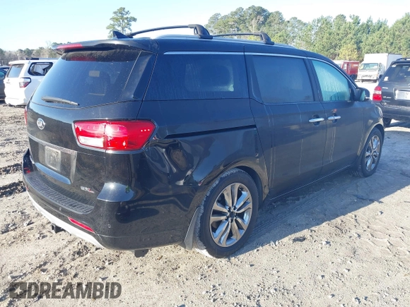 2015 Kia Sedona SX-L with VIN KNDME5C16F6037693, listed as a IAAI auction lot 41779327 with 149,552 mi miles and . Bid and sale history available at DreamBid. Image 4.