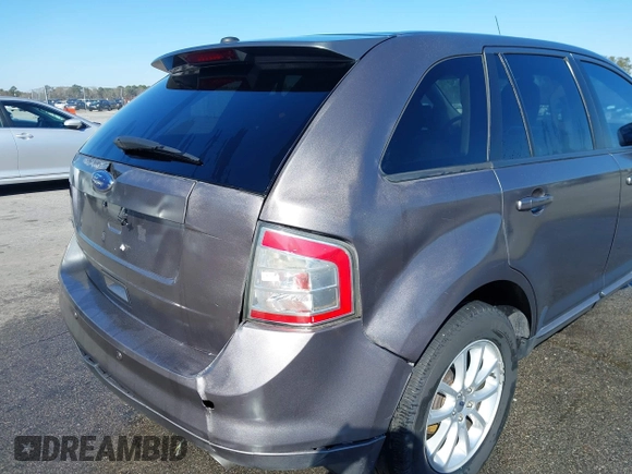 2010 Ford Edge SEL with VIN 2FMDK3JCXABA50115, listed as a IAAI auction lot 41758678 with 207,033 mi miles. Bid and sale history available at carsss.com. Image 16.