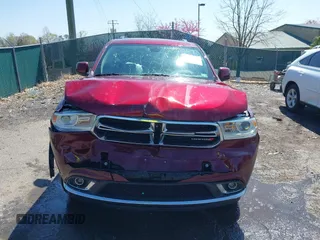 2018 Dodge Durango SXT with VIN 1C4RDJAG2JC133887, listed as a IAAI auction lot 41919409 with 98,692 mi miles and . Bid and sale history available at DreamBid. Image 6.