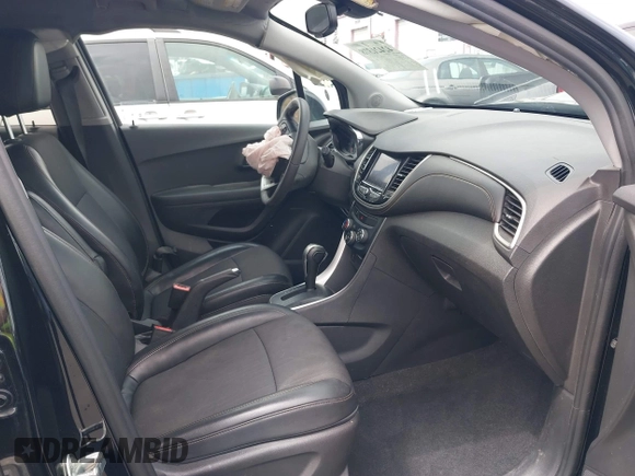 2020 Chevrolet Trax LT with VIN 3GNCJLSB8LL221077, listed as a IAAI auction lot 42421378 with 97,372 mi miles and . Bid and sale history available at DreamBid. Image 5.