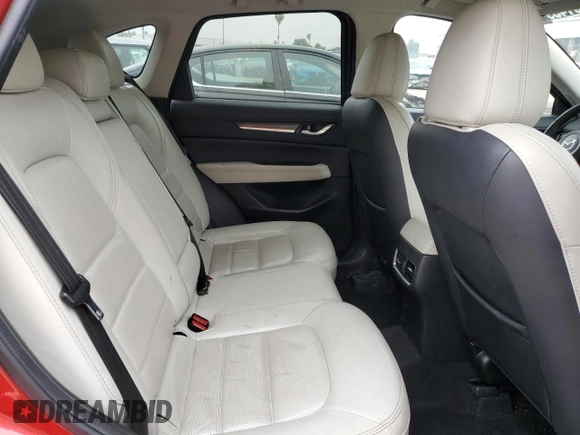 2020 Mazda CX-5 Grand Touring with VIN JM3KFADM1L1837775, listed as a Copart auction lot 55314595 with 82,359 mi miles and Clean Title. Bid and sale history available at DreamBid. Image 11.