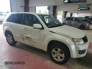 2013 Suzuki Grand Vitara Premium with VIN JS3TD0D64D4100568, listed as a Copart auction lot 63958985 with 140,668 mi miles and Salvage title. Bid and sale history available at DreamBid. Image 4.