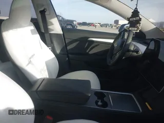 2023 Tesla Model 3 Performance z VIN 5YJ3E1EC5PF689620, wystawiony jako IAAI lot #41814112 z przebiegiem Nie podano mil oraz . Historia ofert i sprzedaży dostępna na DreamBid. Obrazek 5.