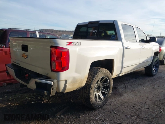 2018 Chevrolet Silverado 1500 LTZ with VIN 3GCUKSEC8JG487892, listed as a IAAI auction lot 41488036 with 142,559 mi miles. Bid and sale history available at carsss.com. Image 4.