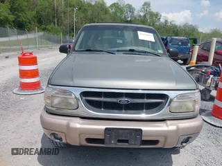 2000 Ford Explorer Eddie Bauer z VIN 1FMDU74E2YUA00568, wystawiony jako IAAI lot #42176409 z przebiegiem 150 479 mil mil oraz . Historia ofert i sprzedaży dostępna na DreamBid. Obrazek 12.