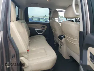 2017 Nissan Titan SV z VIN 1N6AA1E64HN517933, wystawiony jako Copart lot #72793864 z przebiegiem 60 572 mil mil oraz Szkoda całkowita • Salvage title. Historia ofert i sprzedaży dostępna na DreamBid. Obrazek 11.