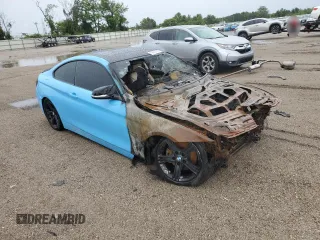 2015 BMW 4 Series 428i with VIN WBA3N3C57FK233312, listed as a Copart auction lot 58927815 with Not provided miles and Non repairable. Bid and sale history available at DreamBid. Image 4.