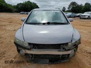 2009 Honda Civic LX z VIN 2HGFA16599H301893, wystawiony jako Copart lot #58815225 z przebiegiem 174 952 mil mil oraz Szkoda całkowita • Salvage title. Historia ofert i sprzedaży dostępna na DreamBid. Obrazek 5.
