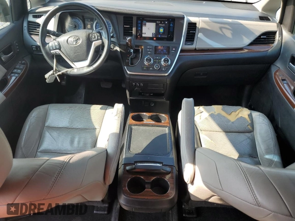 2015 Toyota Sienna XLE с VIN 5TDYK3DC3FS640597, выставлен на аукционе Copart как лот 59334555 с пробегом 187 728 миль миль и Списание • Salvage title. История ставок и продаж доступна на DreamBid. Изображение 8.
