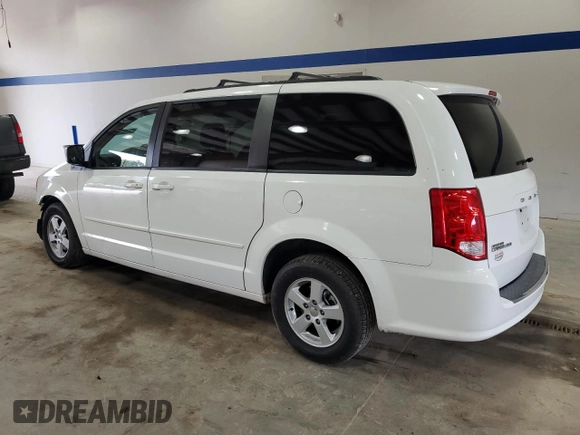 2012 Dodge Grand Caravan SXT with VIN 2C4RDGCG3CR179271, listed as a Copart auction lot 51491005 with 154,217 mi miles and Salvage Title. Bid and sale history available at DreamBid. Image 2.