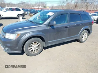 2014 Dodge Journey SXT with VIN 3C4PDCBB2ET156215, listed as a IAAI auction lot 41765840 with 129,737 mi miles and . Bid and sale history available at DreamBid. Image 2.