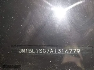 2010 Mazda Mazda3 i Touring with VIN JM1BL1SG7A1316779, listed as a IAAI auction lot 41281210 with 109,257 mi miles. Bid and sale history available at carsss.com. Image 16.