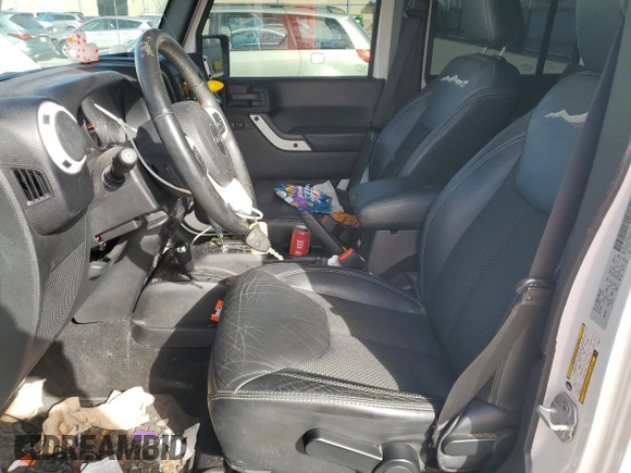 2015 Jeep Wrangler Unlimited Sahara with VIN 1C4BJWEG0FL649724, listed as a Copart auction lot 82189494 with 84,161 mi miles and Salvage Title. Bid and sale history available at carsss.com. Image 7.