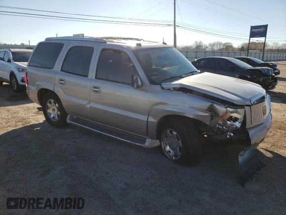 2004 Cadillac Escalade z VIN 1GYEC63T04R107597, wystawiony jako Copart lot #87259974 z przebiegiem Nie podano mil oraz Nie do naprawy • Non repairable. Historia ofert i sprzedaży dostępna na DreamBid. Obrazek 4.