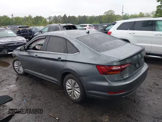 2019 Volkswagen Jetta S z VIN 3VWC57BU7KM232096, wystawiony jako IAAI lot #42317927 z przebiegiem 98 615 mil mil oraz . Historia ofert i sprzedaży dostępna na DreamBid. Obrazek 14.