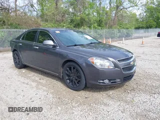2012 Chevrolet Malibu LTZ with VIN 1G1ZG5E74CF297032, listed as a IAAI auction lot 42133482 with 82,682 mi miles and . Bid and sale history available at DreamBid. Image 1.