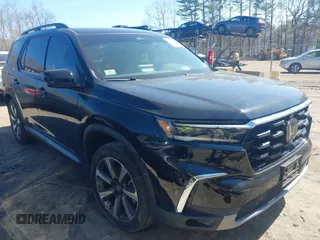 2023 Honda Pilot Elite with VIN 5FNYG1H84PB008077, listed as a IAAI auction lot 42134336 with 41,412 mi miles and . Bid and sale history available at DreamBid. Image 1.