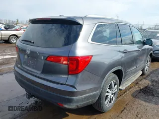 2017 Honda Pilot EX-L with VIN 5FNYF5H53HB029780, listed as a IAAI auction lot 41667838 with 104,803 mi miles. Bid and sale history available at carsss.com. Image 4.