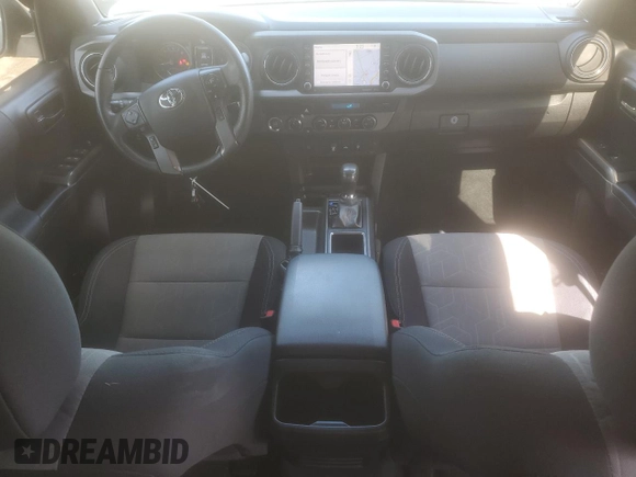 2023 Toyota Tacoma SR z VIN 3TMCZ5AN6PM539899, wystawiony jako Copart lot #52238445 z przebiegiem 30 070 mil mil oraz Szkoda całkowita • Salvage title. Historia ofert i sprzedaży dostępna na DreamBid. Obrazek 8.