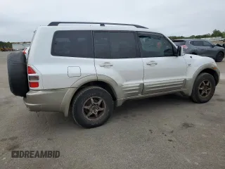 2002 Mitsubishi Montero Limited z VIN JA4MW51R52J027289, wystawiony jako Copart lot #71921024 z przebiegiem 199 334 mil mil oraz Tytuł czysty. Historia ofert i sprzedaży dostępna na DreamBid. Obrazek 3.