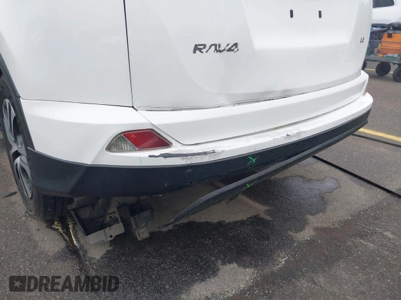 2017 Toyota RAV4 LE with VIN JTMZFREV9HJ704296, listed as a IAAI auction lot 41876996 with 85,605 mi miles and . Bid and sale history available at DreamBid. Image 6.