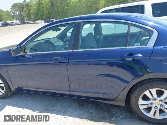 2009 Honda Accord LX-P with VIN 1HGCP26489A042200, listed as a IAAI auction lot 42020214 with 183,588 mi miles and . Bid and sale history available at DreamBid. Image 14.