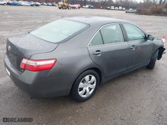 2007 Toyota Camry CE with VIN 4T1BE46K77U688152, listed as a IAAI auction lot 41799406 with 152,033 mi miles. Bid and sale history available at carsss.com. Image 4.