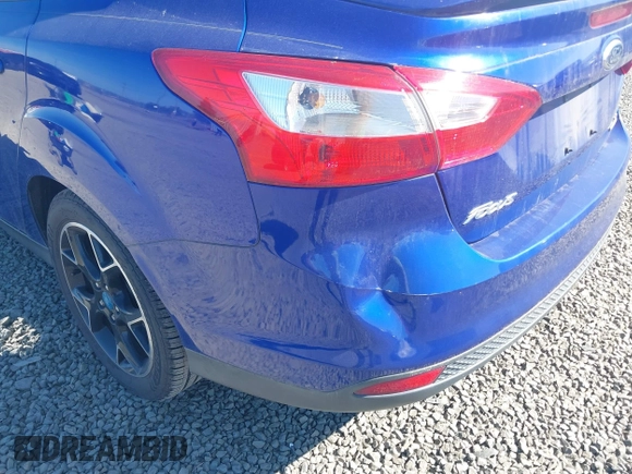 2013 Ford Focus SE z VIN 1FADP3F28DL178210, wystawiony jako IAAI lot #42199073 z przebiegiem 110 542 mil mil oraz . Historia ofert i sprzedaży dostępna na DreamBid. Obrazek 12.