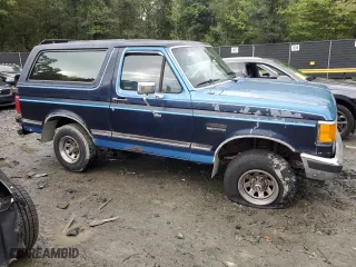 1989 Ford Bronco Custom with VIN 1FMEU15H6KLA27263, listed as a Copart auction lot 73462704 with 88,209 mi miles and Salvage Title. Bid and sale history available at carsss.com. Image 4.