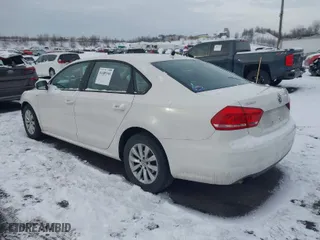 2014 Volkswagen Passat Wolfsburg Ed with VIN 1VWAT7A33EC091975, listed as a IAAI auction lot 41489344 with 97,306 mi miles. Bid and sale history available at carsss.com. Image 3.