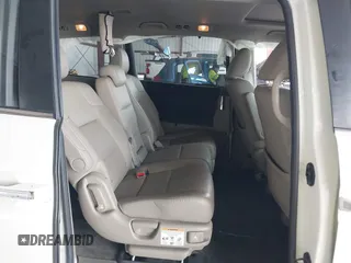 2015 Honda Odyssey EX-L with VIN 5FNRL5H64FB084175, listed as a IAAI auction lot 41943540 with 67,902 mi miles and . Bid and sale history available at carsss.com. Image 8.