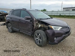 2016 Toyota RAV4 XLE with VIN 2T3RFREV0GW517044, listed as a Copart auction lot 59749195 with 81,834 mi miles and Salvage title. Bid and sale history available at DreamBid. Image 4.