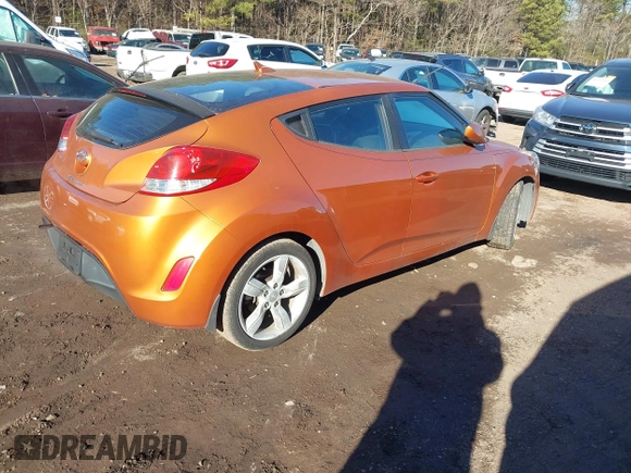 2013 Hyundai Veloster w/Gray Int with VIN KMHTC6AD3DU126193, listed as a IAAI auction lot 41251982 with 119,066 mi miles. Bid and sale history available at carsss.com. Image 4.
