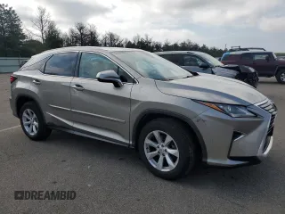2017 Lexus RX 350 with VIN 2T2BZMCA2HC114007, listed as a Copart auction lot 63587985 with 61,421 mi miles and Salvage title. Bid and sale history available at DreamBid. Image 4.