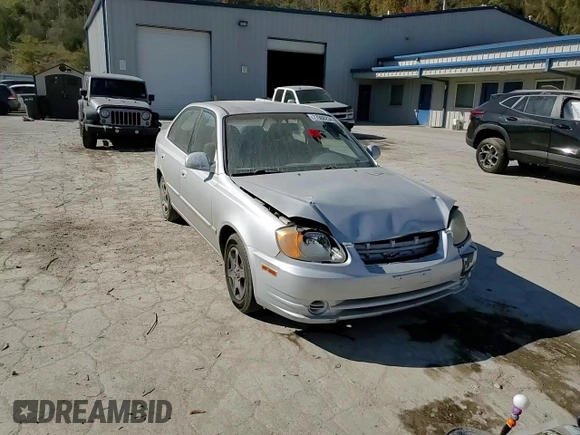 2005 Hyundai Accent GLS with VIN KMHCG45C75U638812, listed as a Copart auction lot 77968234 with 130,815 mi miles and Salvage Title. Bid and sale history available at carsss.com. Image 11.