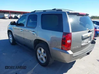 2007 Chevrolet Tahoe LTZ with VIN 1GNFC13J97R155705, listed as a IAAI auction lot 40914171 with 165,727 mi miles and . Bid and sale history available at DreamBid. Image 3.
