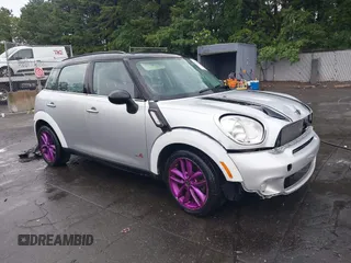 2012 MINI Countryman S with VIN WMWZC5C55CWM12772, listed as a IAAI auction lot 42586113 with 139,485 mi miles and . Bid and sale history available at DreamBid. Image 1.