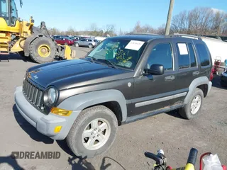 2005 Jeep Liberty Sport with VIN 1J4GL48K85W700799, listed as a IAAI auction lot 42054433 with 166,989 mi miles. Bid and sale history available at carsss.com. Image 2.