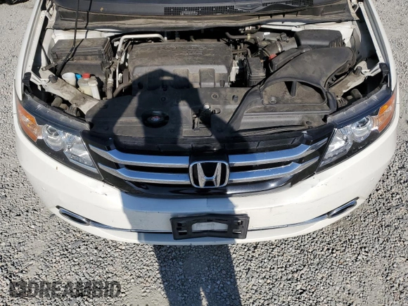 2016 Honda Odyssey Touring Elite with VIN 5FNRL5H9XGB006981, listed as a Copart auction lot 63970385 with 165,164 mi miles and Salvage title. Bid and sale history available at DreamBid. Image 12.