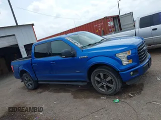 2015 Ford F-150 XL with VIN 1FTEW1CG1FKD20413, listed as a IAAI auction lot 41694489 with 147,431 mi miles and . Bid and sale history available at DreamBid. Image 13.
